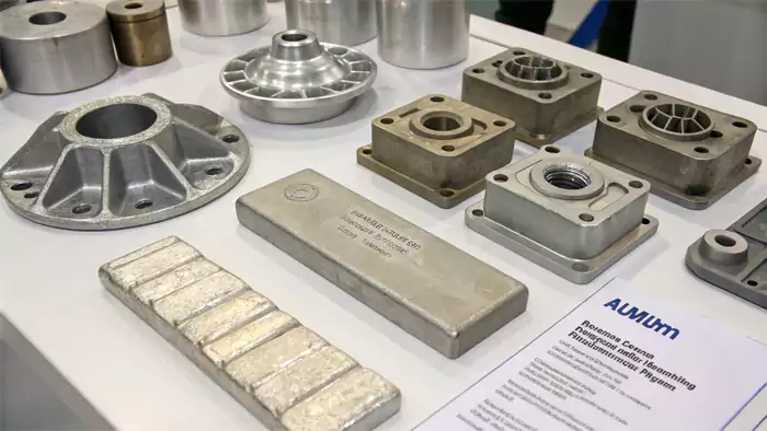 Samples of common die casting metals: aluminum, zinc, and magnesium ingots or parts