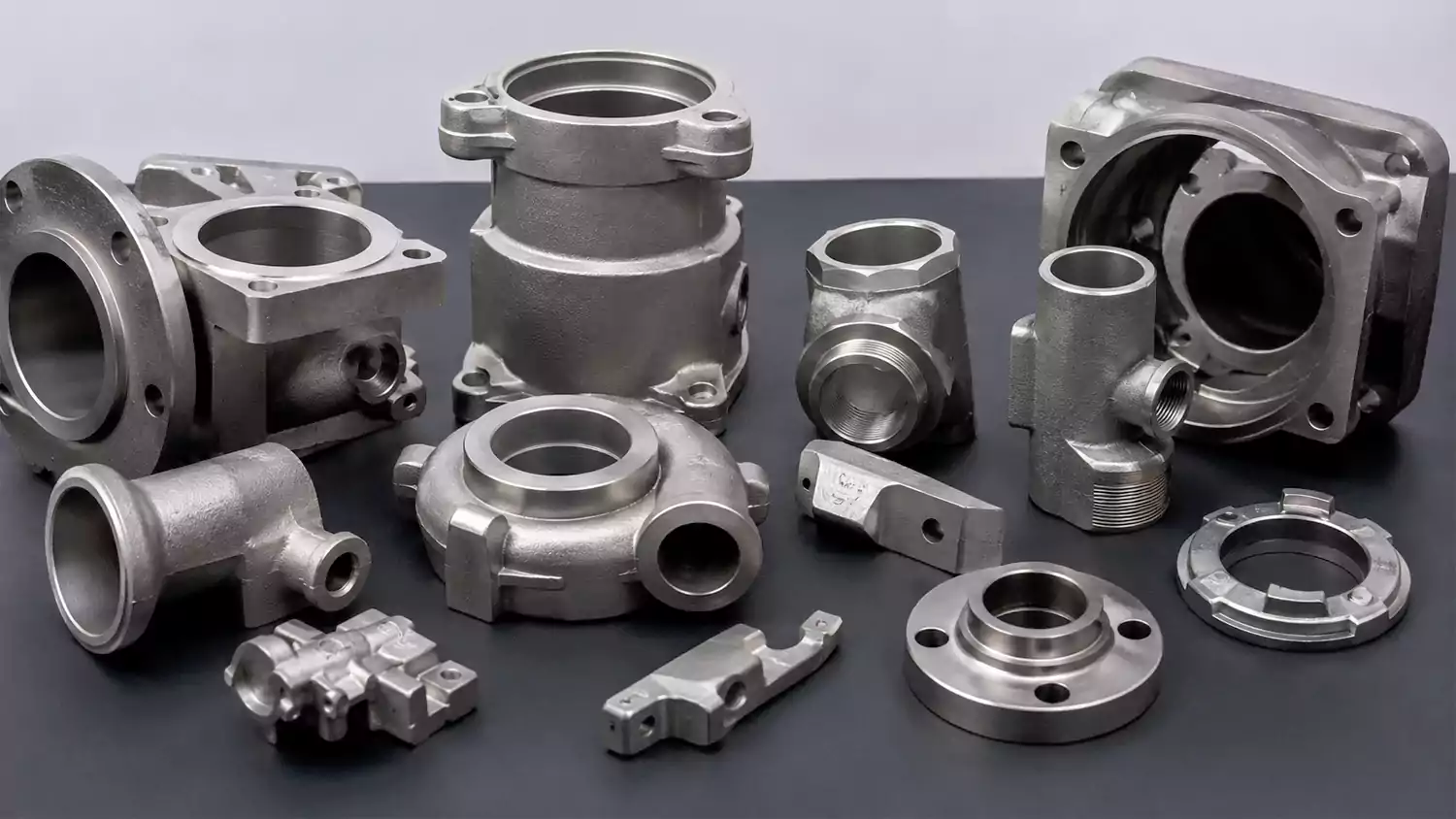 precipitation hardening stainless steel casting components with heat treated surface