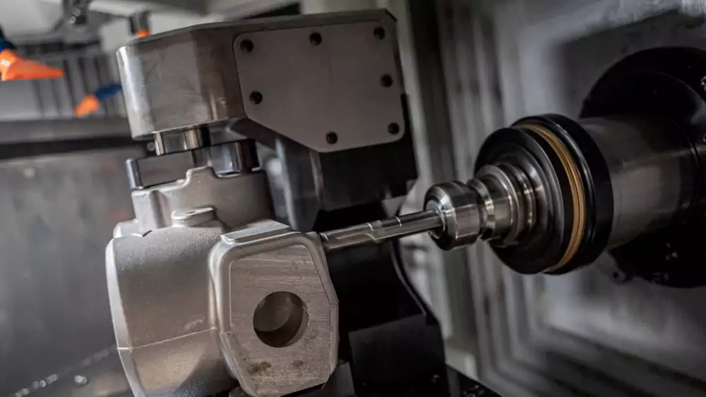 Cast oil pump housing prepared for precision CNC machining