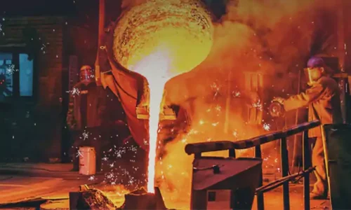 Scenes from the investment casting workshop- pouring stainless steel melt into a ceramic shell